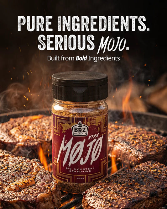 BRZ Food Xtra Mojo Steak Seasoning served with grilled steak, chicken, seafood and vegetables showcasing its versatility for barbecue cooking. - Secondary view