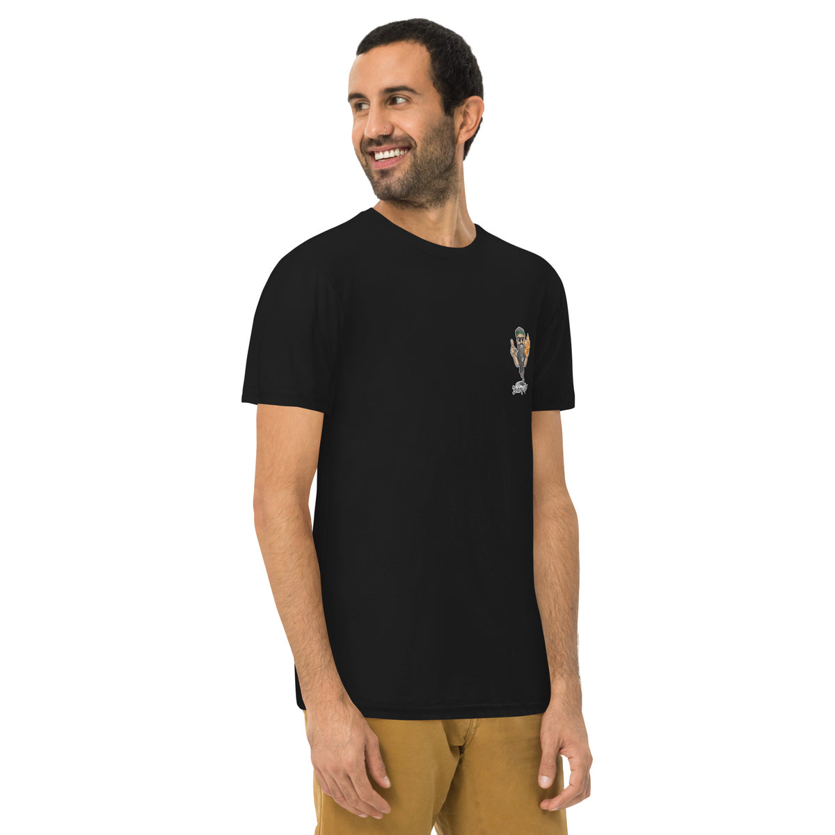Man wearing the black tee from the front, the chest badge just visible